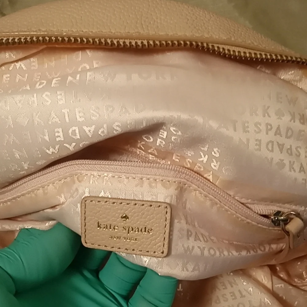 Kate Spade Elegant Pink Cream Backpack with gold Hardware